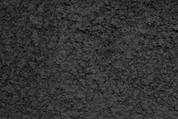istock Rough Textured of Black Cement Wall Background 1385137665