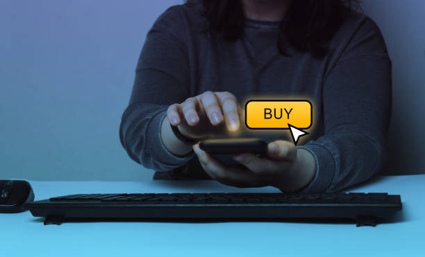 istock Woman shopping through smartphone on app. 1385137774