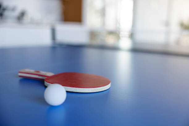 istock Table Tennis Ball and Racket On The Table 1385139540