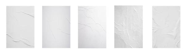istock Five sheets of white crumpled paper isolated on a white background. 1385141292
