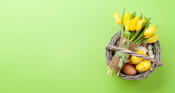 istock Easter greeting card with tulips and eggs 1385149218
