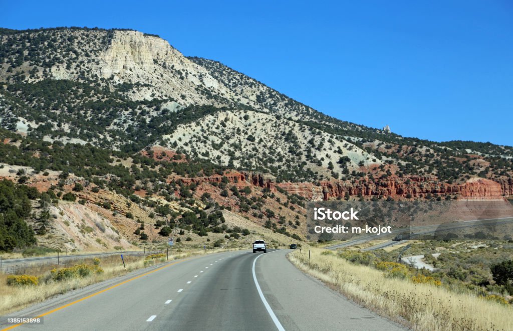 Colorful cliffs and I-70 Driving I-70 in Utah Beauty Stock Photo