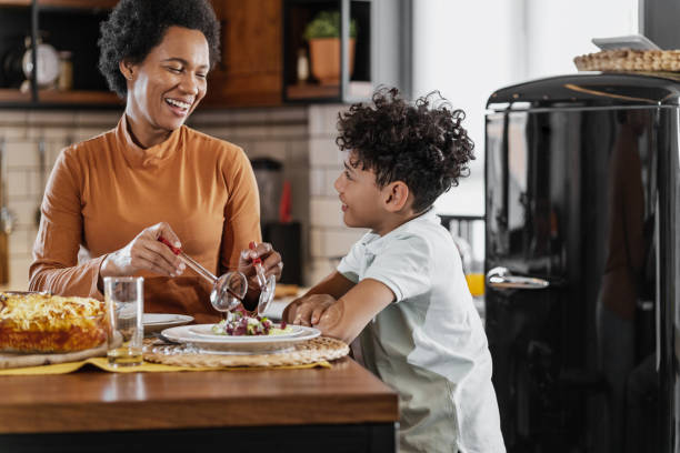 istock Lunch time with mother at home 1385157516