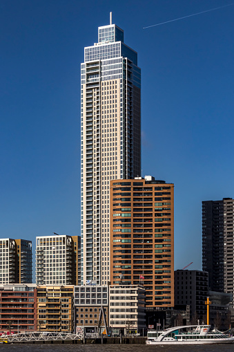Rotterdam, The Netherlands - February 23, 2022: skyline with in the middle the Zalmhaven Toren, a 215 metres residential tower.