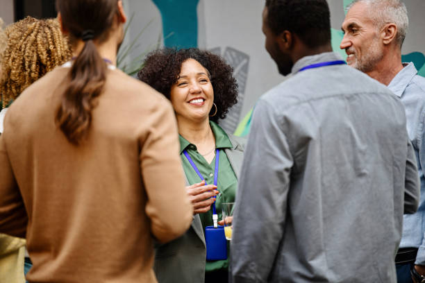 istock Multiethnic business people talk during a coffee break 1385168439