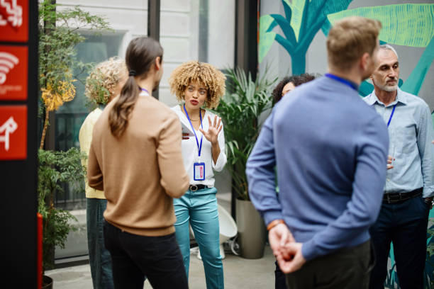 multiethnic business people talk during a coffee break - business conference meeting teamwork imagens e fotografias de stock