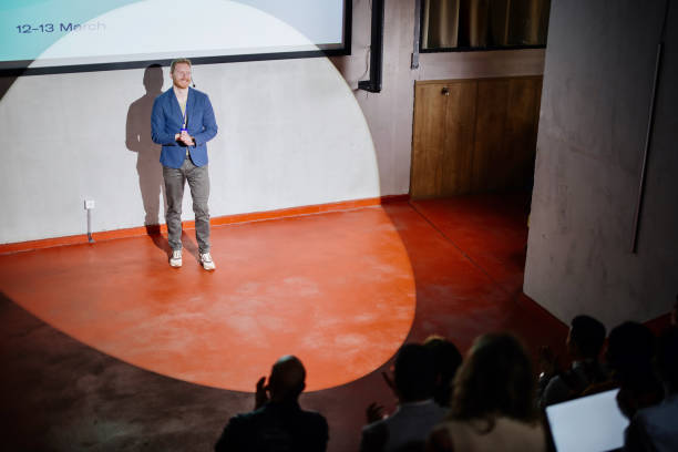 istock Public speaker at diversity in workplace convention. 1385168448