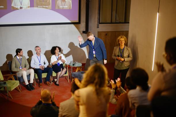 istock A confident businesswoman introduces a panel of experts during a business conference. 1385168731