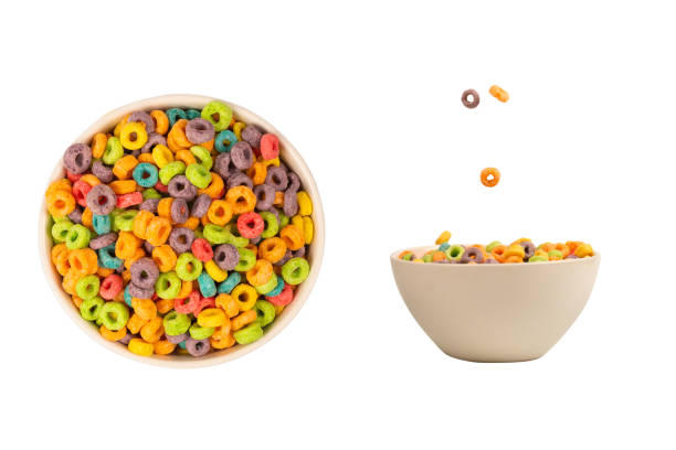 istock Colorful rings cereal spill out into a bowl. Breakfast. Isolated. 1385169070
