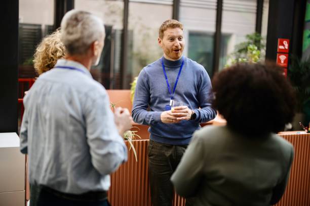 istock Business people greet each other during a coffee break at a conference 1385170534