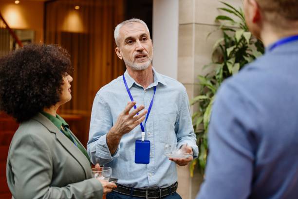istock Multiethnic business people talk during a coffee break 1385170541