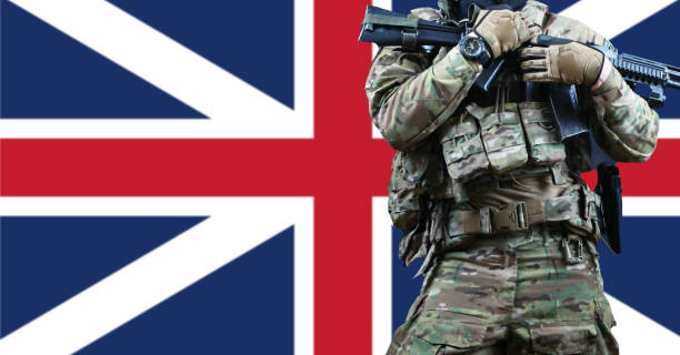 istock Male soldier in tactical equipment and uniform . 1385177976