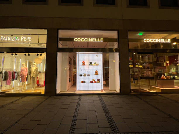 Chanel Fashion Store Munich, Bavaria Germany - February 22, 2022: Chanel high-end German fashion store shop front logo. karl lagerfeld stock pictures, royalty-free photos & images