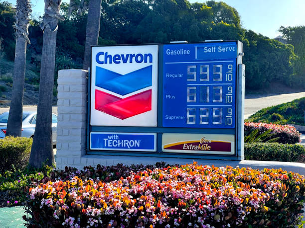 Gas Prices Reach Record Highs at the Pump Station San Diego, California March 14th 2022: After rising dramatically following Russia's invasion of Ukraine, the price of gas reached a record, topping a high that had stood for nearly 14 years. fuel prices photos stock pictures, royalty-free photos & images