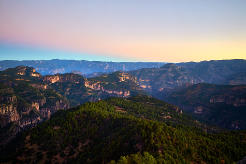 Sunrise in the canyons decla Sierra Madre Occidental in Durango with beautiful colors in the sky and green forests around