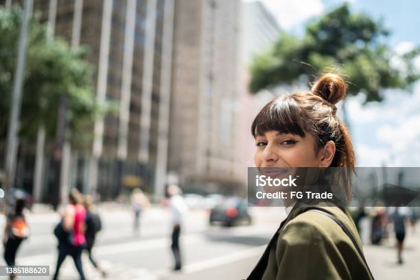 Portrait Of A Young Woman In The Street Stock Photo - Download Image Now - One Woman Only, Portrait, City