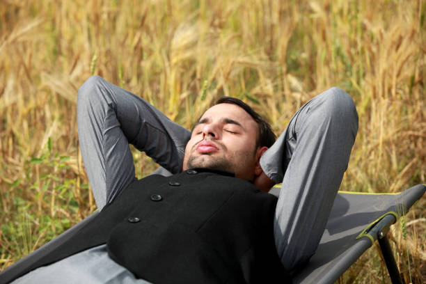 Beautiful woman relaxing on a grass