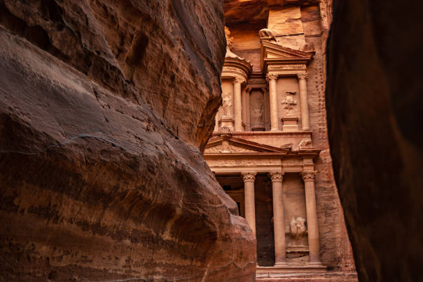 Al-Khazneh ("The Treasury"‎‎) is one of the most elaborate temples in the ancient Arab Nabatean Kingdom city of Petra. This structure was carved out of a sandstone rock face. stock photo