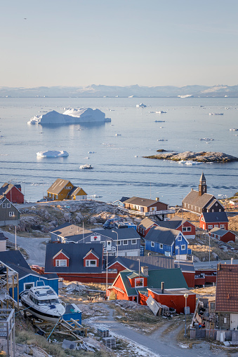 tipical greenlandic town behind the icebergs