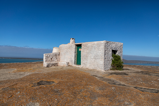Langebaan, South Africa - February 20, 2022: The small museum on top of a large granite rock at the Seeberg viewpoint in the West Coast National Park in Langebaan South Africa