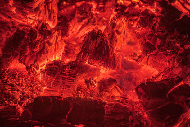 Hot red coals of a camp fire