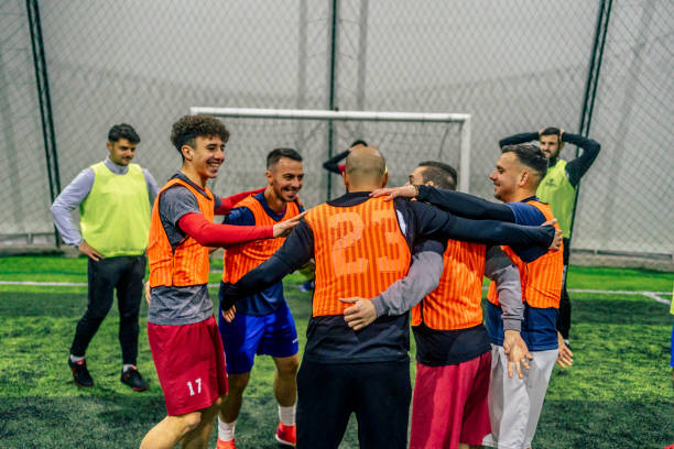 istock Soccer players celebrating after winning the match 1385202428