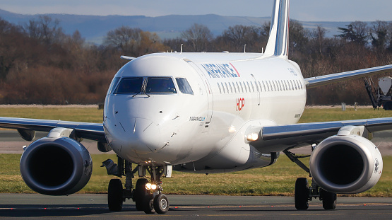 Manchester Airport, United Kingdom - 10 March, 2022: Air France Embraer 170 (F-HBLO) taxiing to T1 after landing from Paris (CDG), France.