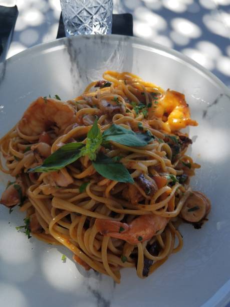 Seafood Pasta from the Myconian Imperial Hotel stock photo