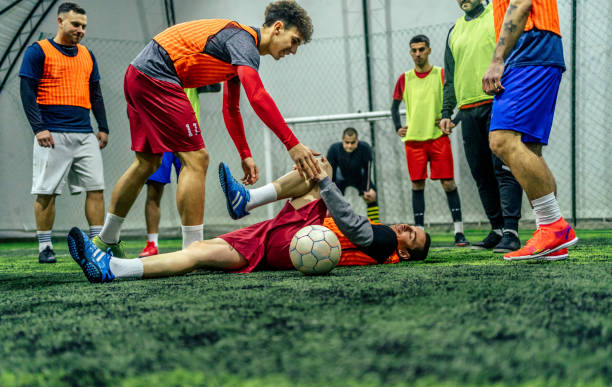 istock Soccer player get got injured in the game 1385204190