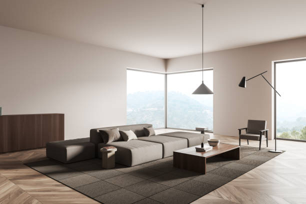 istock Bright living room interior with sofa, armchair, panoramic window 1385210250