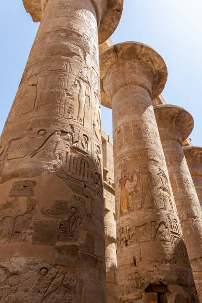 istock Massive columns inside a beautiful Egyptian temple in Luxor with hieroglyphics. 1385211565