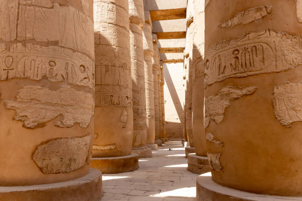 istock Massive columns inside a beautiful Egyptian temple in Luxor with hieroglyphics. 1385211593