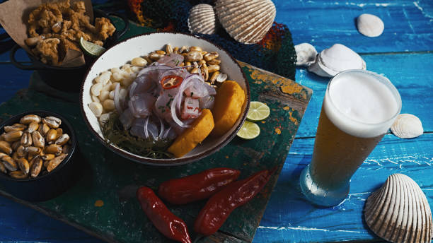 Peruvian ceviche and squid chicharron stock photo