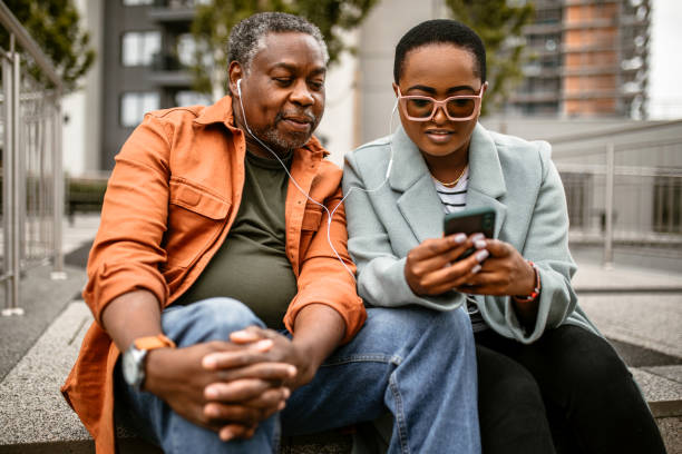 istock Senior father and daughter taking a rest from city walk 1385216848