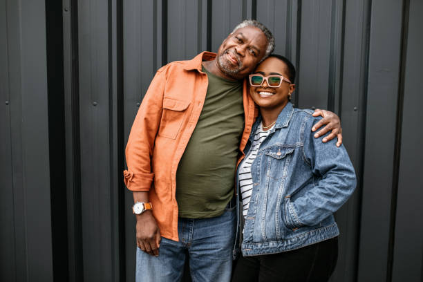 istock Cheerful father and daughter posing for photo 1385216878