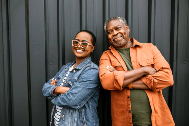 istock Cheerful father and daughter posing for photo 1385216911