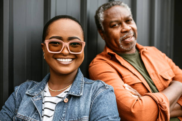 istock Cheerful father and daughter posing for photo 1385217002