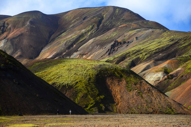istock Hikers on a valley in Landmannalaugar 1385222451