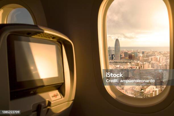 Barcelona City Spain At Sunset Sunrise Sky Aerial View From Window Airplane Economic Seat After Take Off From Airport Stock Photo - Download Image Now