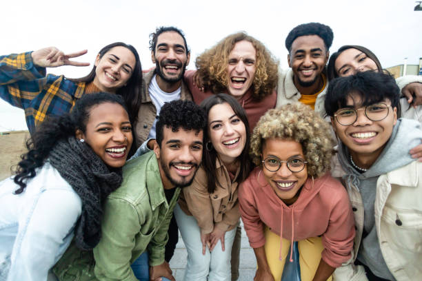 istock Happy group of multiethnic young friends 1385222797