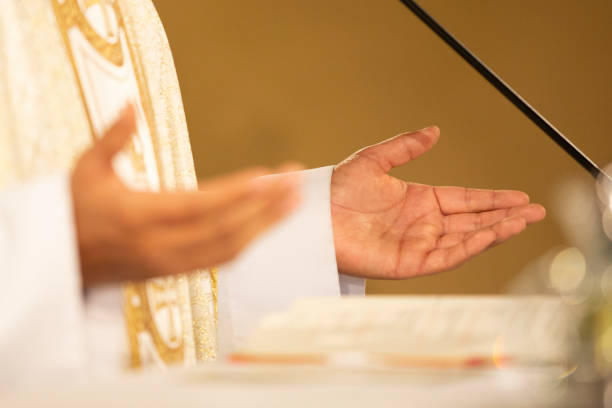 hands of a priest during a wedding ceremony wedding mass