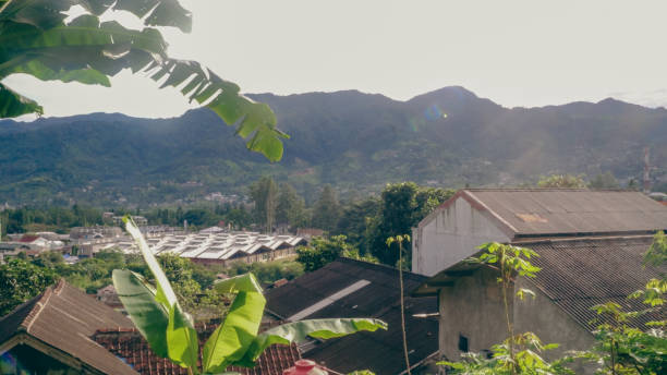 istock mountain view with green dome mosque in countryside 1385260620