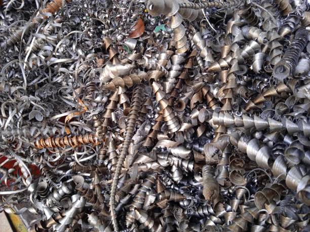 istock Pile of waste from iron material produced from CNC machines 1385264967