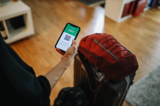istock checking covid passport before traveling 1385265375