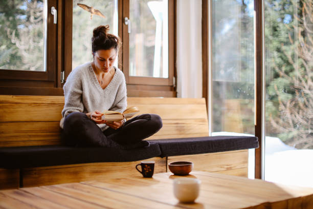 istock spending an eassy afternoon in the cabin retreat 1385273986
