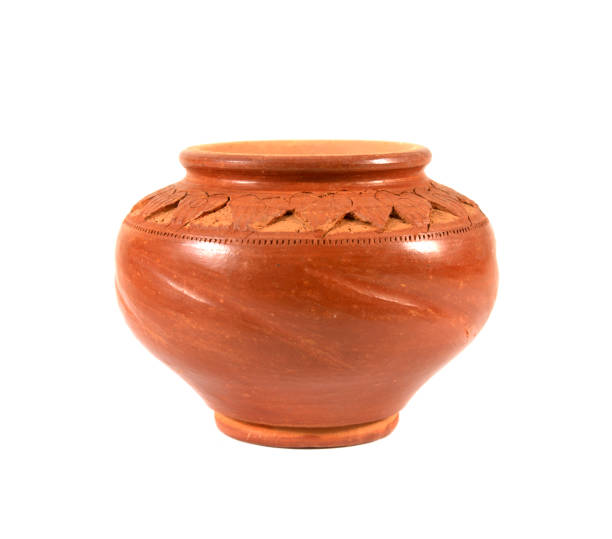 istock Small clay pot for drinking water isolated on white background. 1385277306