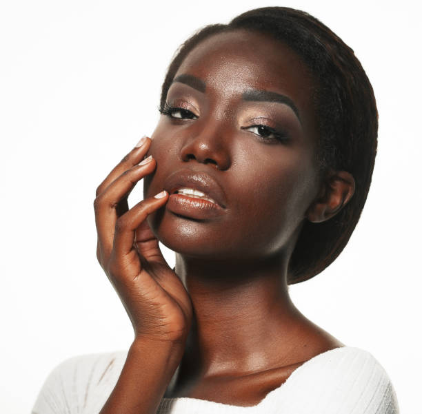 istock Beautiful black woman posing in a studio 1385278203