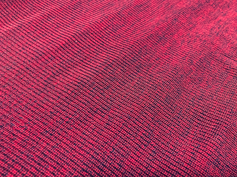 A red fabric with a little blue.