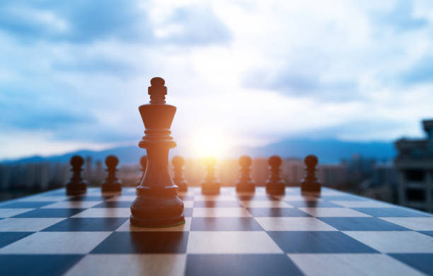 istock Chess king and pawns on the chess board 1385299391