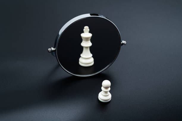 Black pawn on white background.